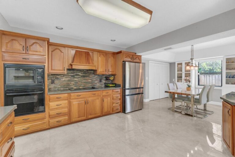Miami Single-Family Home Sold for $716,500: How Anna Jimenez Navigated an Attic Fire, Remote Sellers in Dubai, and Two Fallen Contracts to Close the Deal